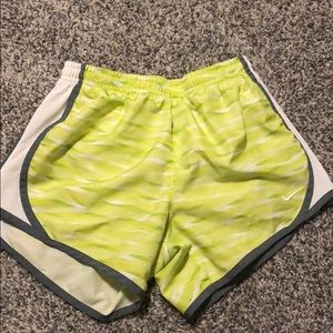 green and white nike running shorts